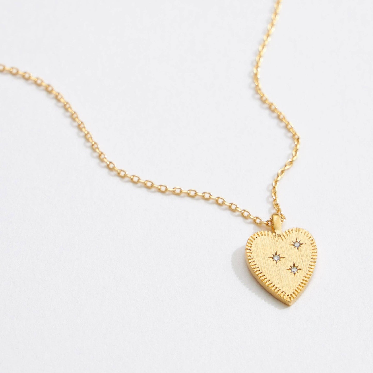 Gold Heart Pendant Necklace with Star Details